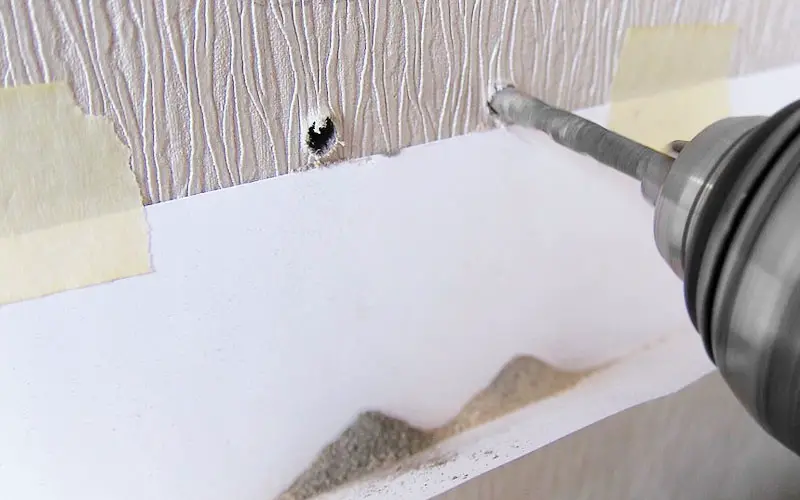 An image of a successfully drilled hole in a bathroom