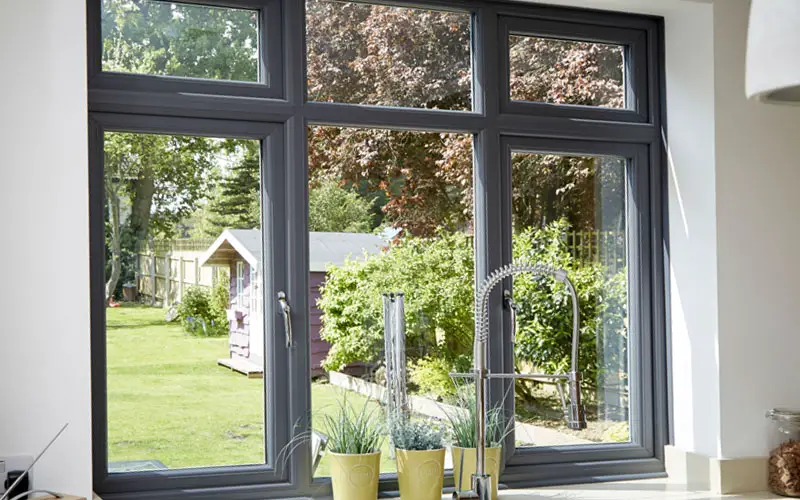 An image showing freshly painted upvc windows inside a modern kitchen